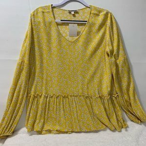 Pleione V-Neck Long Sleeve Ruffled Bottom Blouse